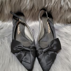 Worn Black Bow Heels
